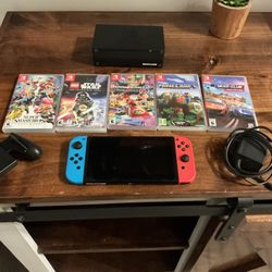 Nintendo Switch, console, controller, charger and games
