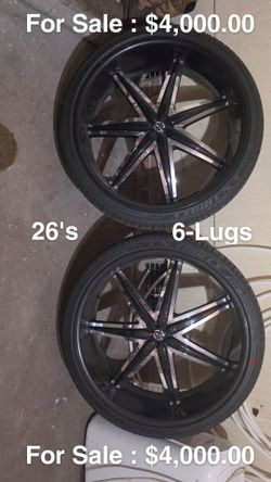 26 inch rims and brand new tires and rims  black and chrome