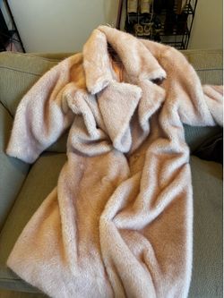 Pink faux fur coat