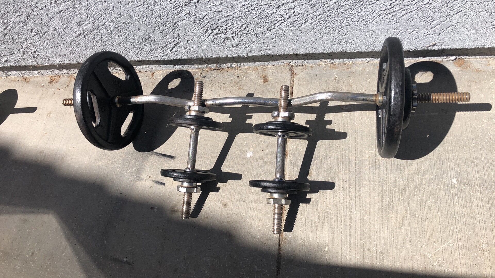 Weight Sets 164 Pounds Plus 3 Bars And 2 Dumbbell Bars $225 Or I Can Sell individual