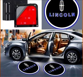 2 Lincoln universal Wireless projector door lights $35. Lincoln seat belt shoulder pads $40. SHIPPING AVAILABLE