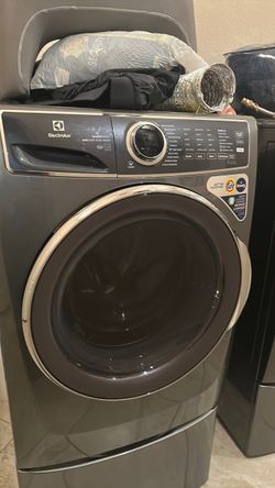 Electrolux Washing Machine and Dryer combo with petal stools
