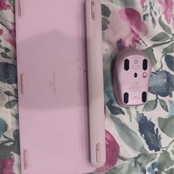 Pink mouse with keyboard