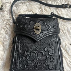 For sale!   Brand new leather tooled Ukrainian gothic purse (can change straps to be a backpack) 