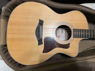 Bran new Taylor Acoustic-Electric Guitar