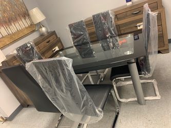 Brand new black table set (6 chairs) MUST GO ASAP