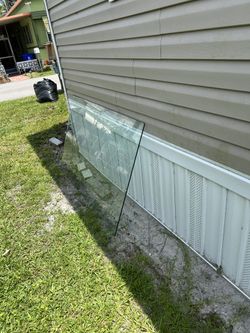 A Table Glass 3x5ft For 150.00 Dollars