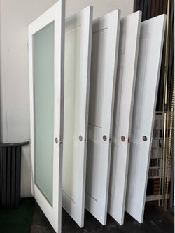 White Interior Doors with Round Bore Holes