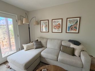Living Spaces Cream Reversible Sectional Sofa