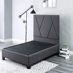 Queen sized Living Spaces contempo navy fabric bed with mattress