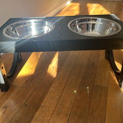 Black plastic dog bowl stand with bowls 19" x 8 1/2"