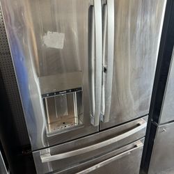 Ge Stainless Steel Four-Door Refrigerator Only $799