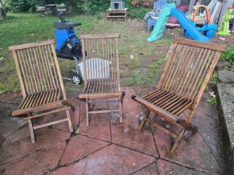 Price is firm.. three solid teak folding patio chairs
