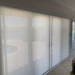 Two Roller Shades Over Sliding Glass Door   With Metal.  Facial   Cord Loop    1%.   Pick Up Only.