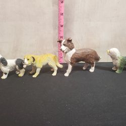 @CHV.  Lot of 4 dog dogs figure 