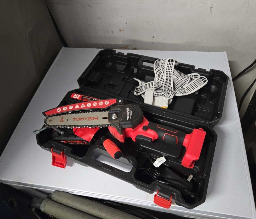 6" Handheld Chainsaw. Used Once. Works Great