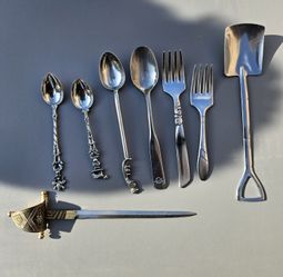 vintage Italian silver-plated cocktail utensils and a decorative sword Letter Opener