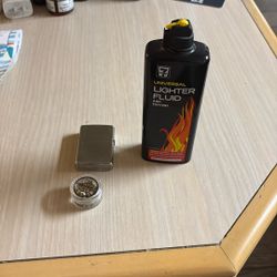 Zippo Lighter With Lighter Fluid And 100 Flints
