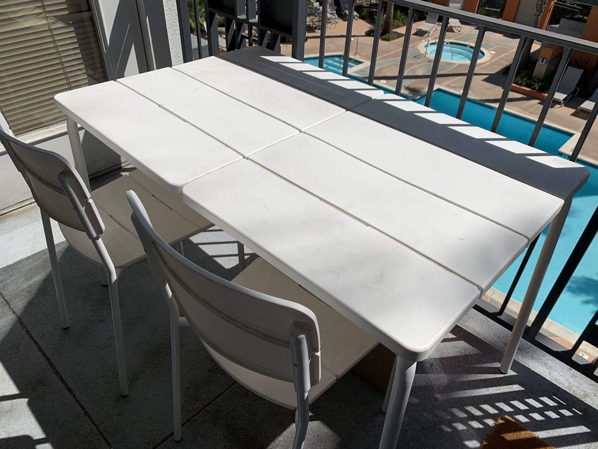 Ikea white Patio furniture (70% off) - one table, 2 chairs and 2 stools