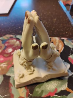 CERAMIC PRAYING HANDS ON BIBLE FIGURINE