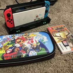 Nintendo Switch w/charging dock, case +2 games,  & extra light up controllers