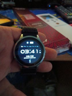 Watch and charger