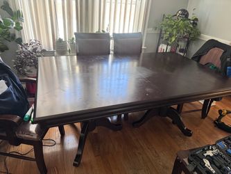 Wood dining table and six chairs