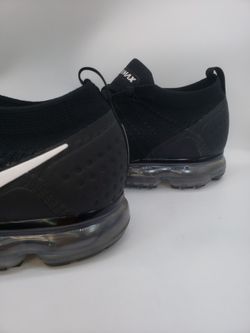 Black vapormax top white swoosh