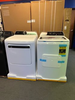 Frigidaire white and black washer and dryer