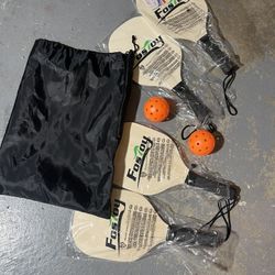 Pickle Ball Paddles and Balls. NEW