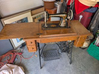 Antique Singer Treadle Sewing Machine with Cabinet