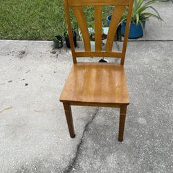 Dining table and 4 matching chairs in good, sturdy condition. The set is solid wood with a classic natural finish. Great for a kitchen or dining space