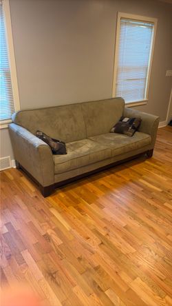 Beige Sofa with Accent Pillows