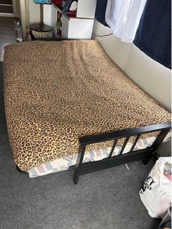 Queen futon barely used cushion never exposed