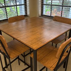 Hi top dining room table and four chairs looks brand new