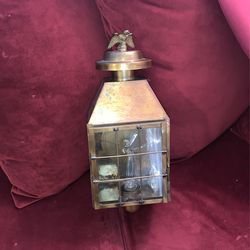 Converted antique wall light with flickering Bob