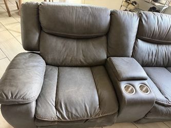 Gray Leather Reclining Loveseat with Cup Holders