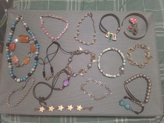 ANKLE, BRACELETS AND A HAND CRAFTED BY MR LEE