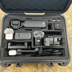 DJI Osmo Pocket 3 3-Axis 4K Handheld Camera in case with accessories