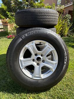 Michelin 245/75R17 Tires on Silver Alloy Wheels