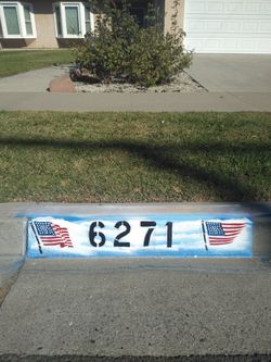 Hand painted curb address design
