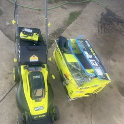 RYOBI ONE+ 18V 13 in. Cordless Battery Walk Behind Push Lawn Mower with 4.0 Ah Battery and Charger