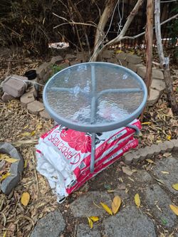 Back yard glas and metal table