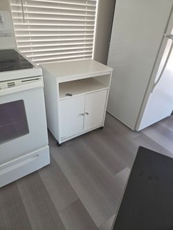 Rolling pantry table storage unit island