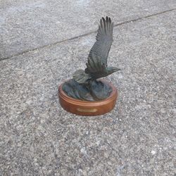 Graceful catch by sea burleson iron statue