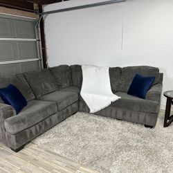 Free delivery Ashley Furniture dark gray 2-piece L shaped sectional couch retails $1400