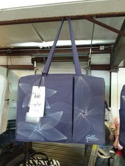 Laptop bags, new, padded inside with separate compartments and atttatches cleaner rag