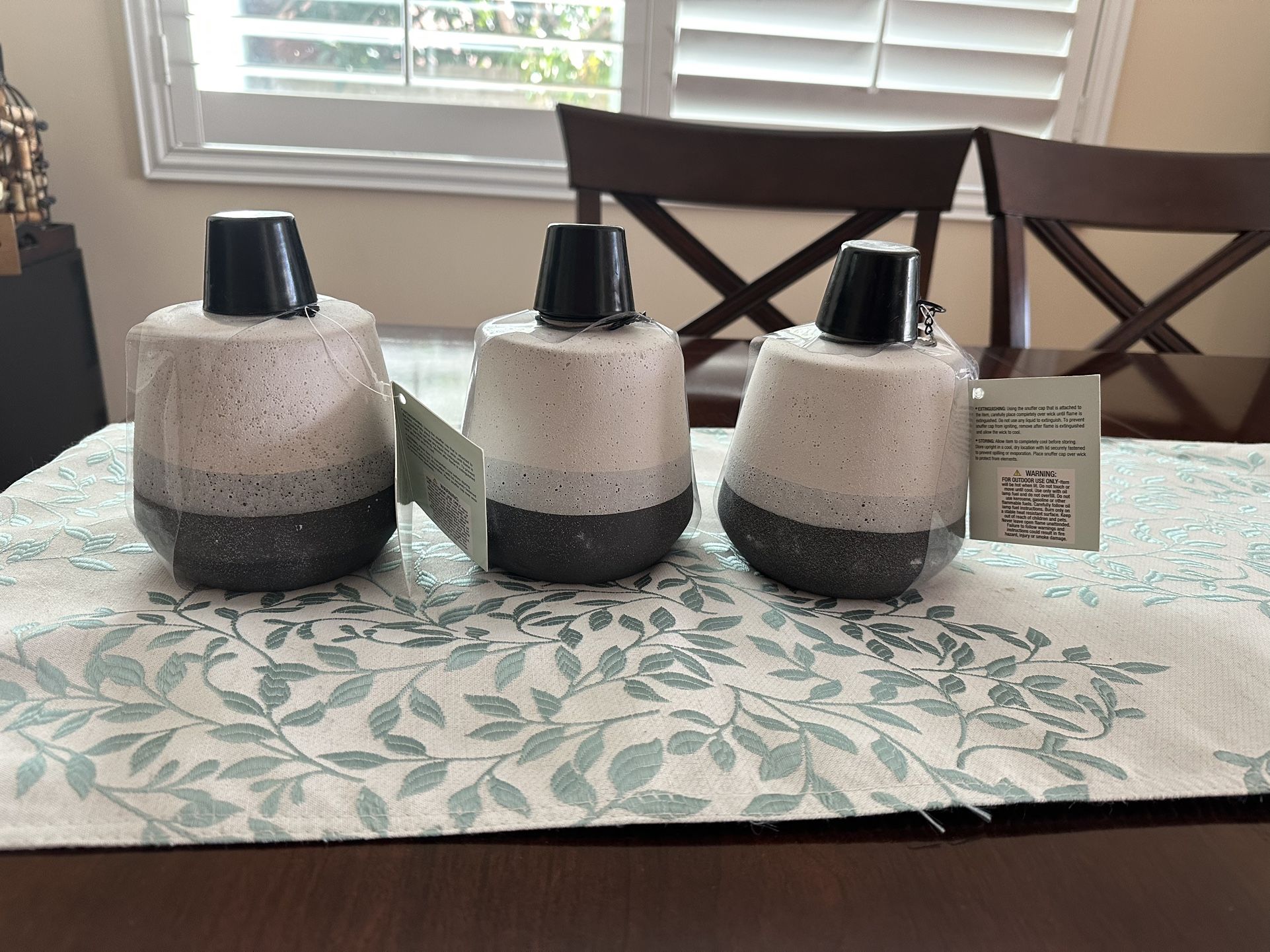 Brand new, table top tiki torches. $8 each or all three for $20. Retail is $16 each