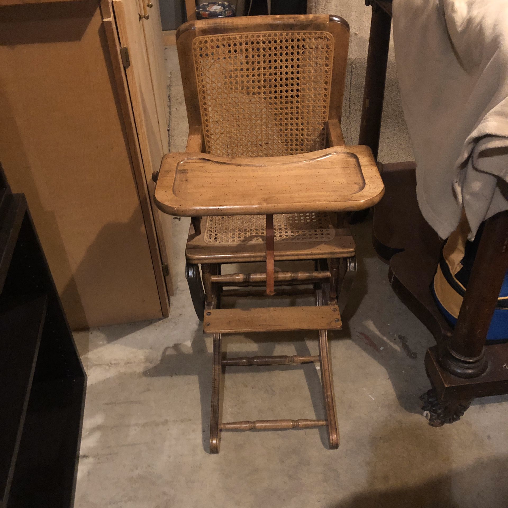 Antique high chair that changes to rocker