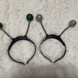 New light up antenna headband with glitter ball accents in green and silver. These are heavy duty with sturdy headband and thick coils not the cheap k